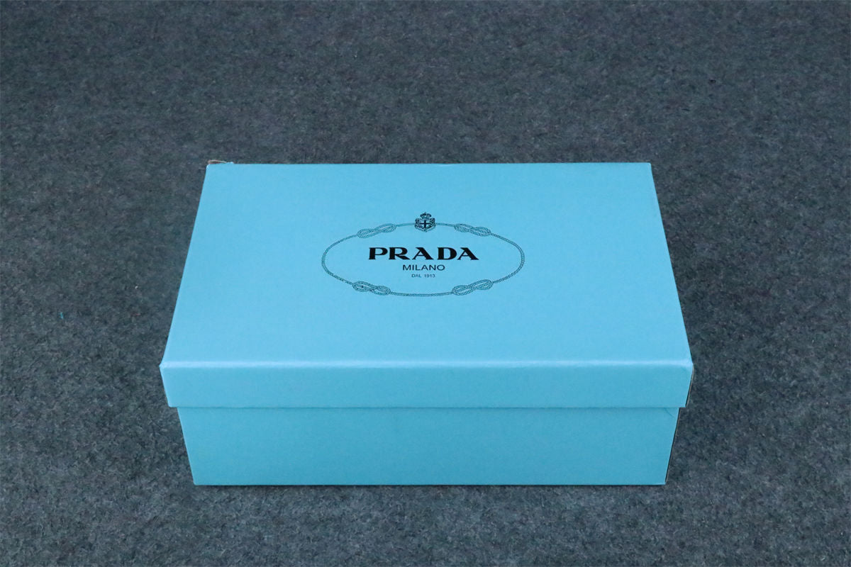 Prada Triangle Logo-Plaque Shearling Backless Loafer